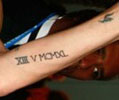 Angelina Jolie tatouage XIII